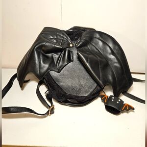 Aza Batwing leather and lace back pack/ purse